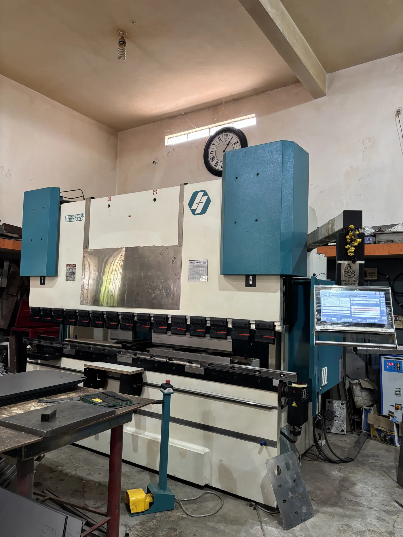 CNC press brake bending area on the sheet metal shop floor